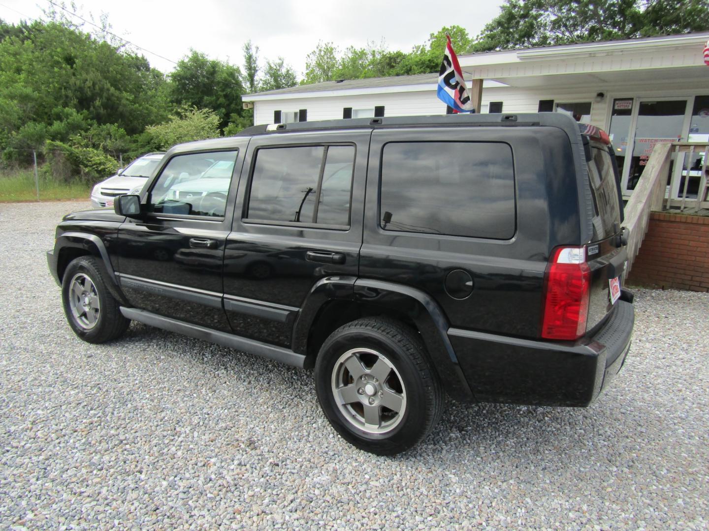 2007 Black /Gray Jeep Commander Sport 2WD (1J8HH48P37C) with an 4.7L V8 SOHC 16V FFV engine, Automatic transmission, located at 15016 S Hwy 231, Midland City, AL, 36350, (334) 983-3001, 31.306210, -85.495277 - Photo#5